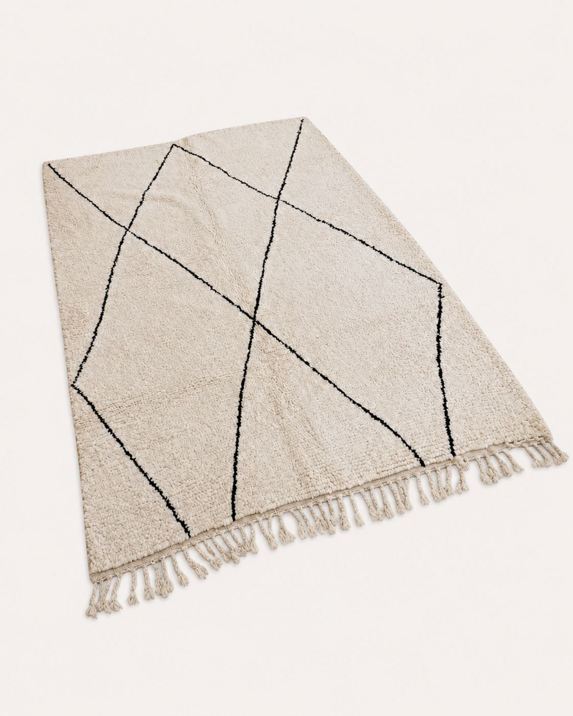Back view showing the handmade construction and finished edges of the rug.