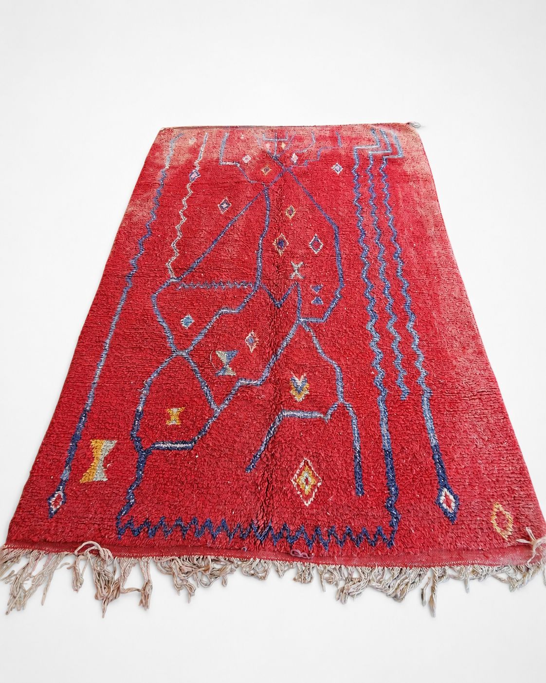 Back view showing the rug’s handmade construction and finished edges.