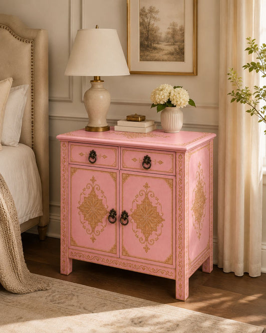Pink Moroccan wooden storage cabinet with gold artisan patterns