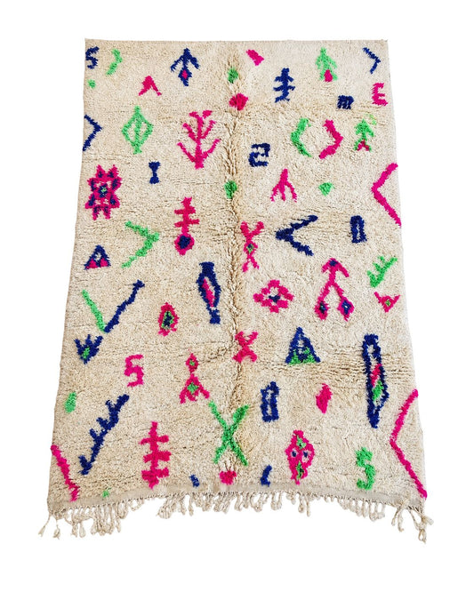 Handmade ivory Moroccan wool rug with colorful pink, blue, and green abstract motifs.