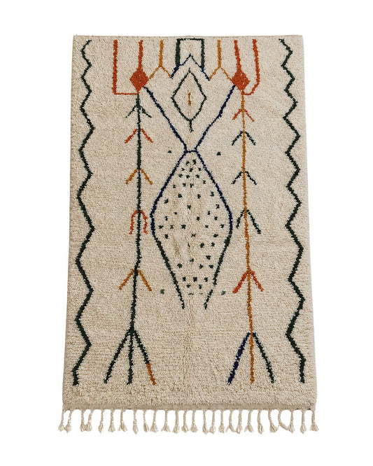 Full overview of the rectangular handmade Moroccan wool rug displaying its ivory background and abstract geometric patterns 
