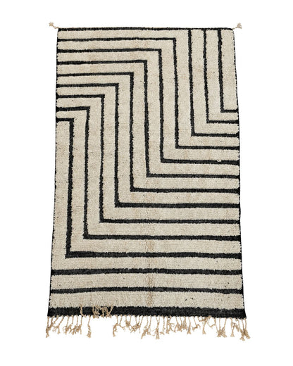 Ivory handmade Moroccan wool rug with bold black maze-style geometric lines. 
