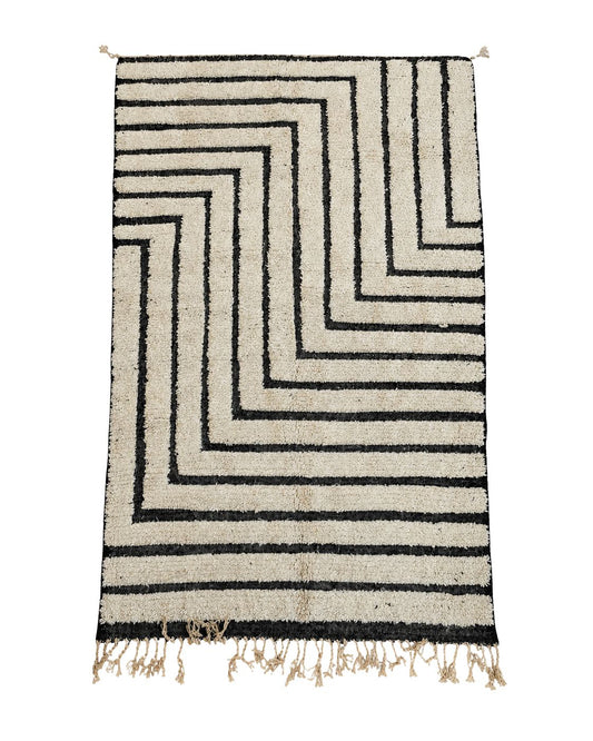 Ivory handmade Moroccan wool rug with bold black maze-style geometric lines. 