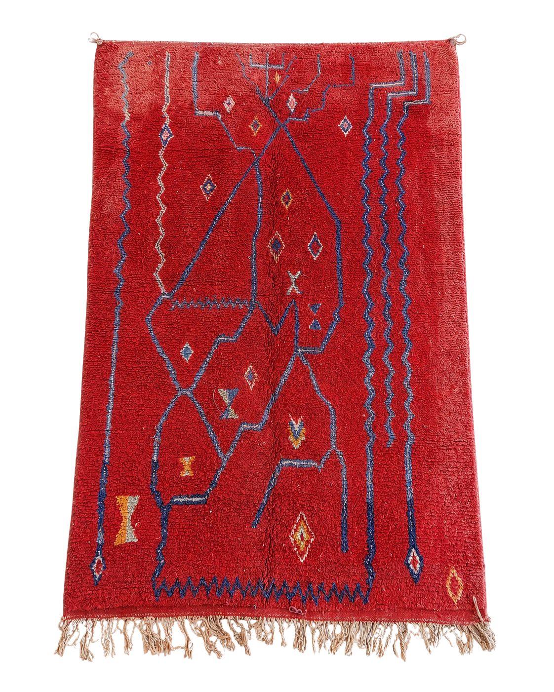 Red handmade Moroccan rug with dark blue abstract lines and geometric motifs. 