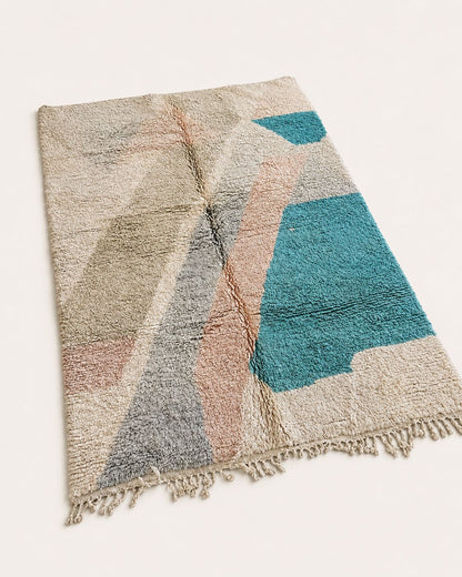 Back view showing the handmade construction and finished edges of the rug. 