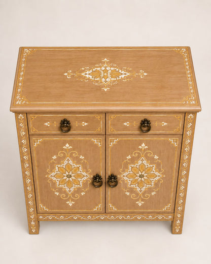 Close-up of hand-painted geometric motifs on a wooden cabinet