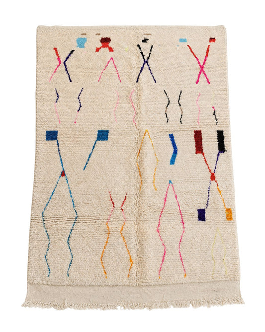 Ivory handmade Moroccan wool rug with colorful minimalist geometric motifs. 