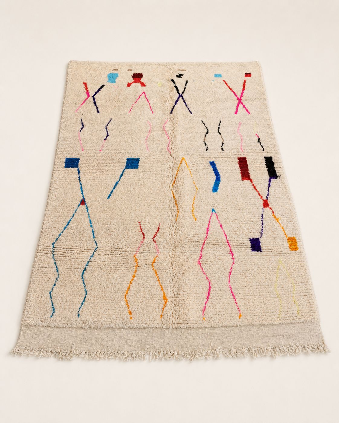 Back view showing the handmade construction and finished edges of the wool rug. 