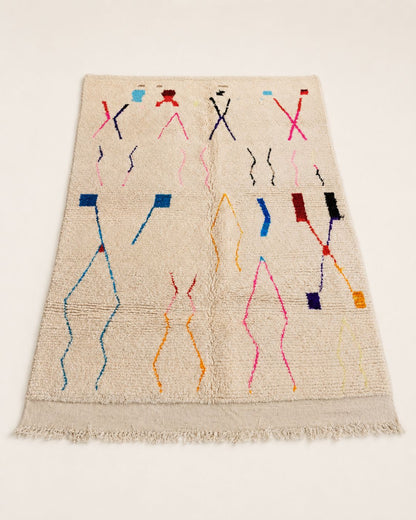 Back view showing the handmade construction and finished edges of the wool rug. 