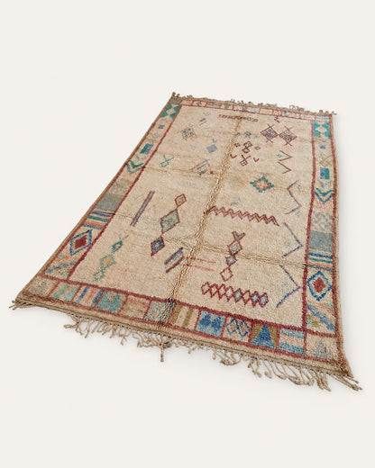 Back view showing the handmade construction and aged finish of the rug. 