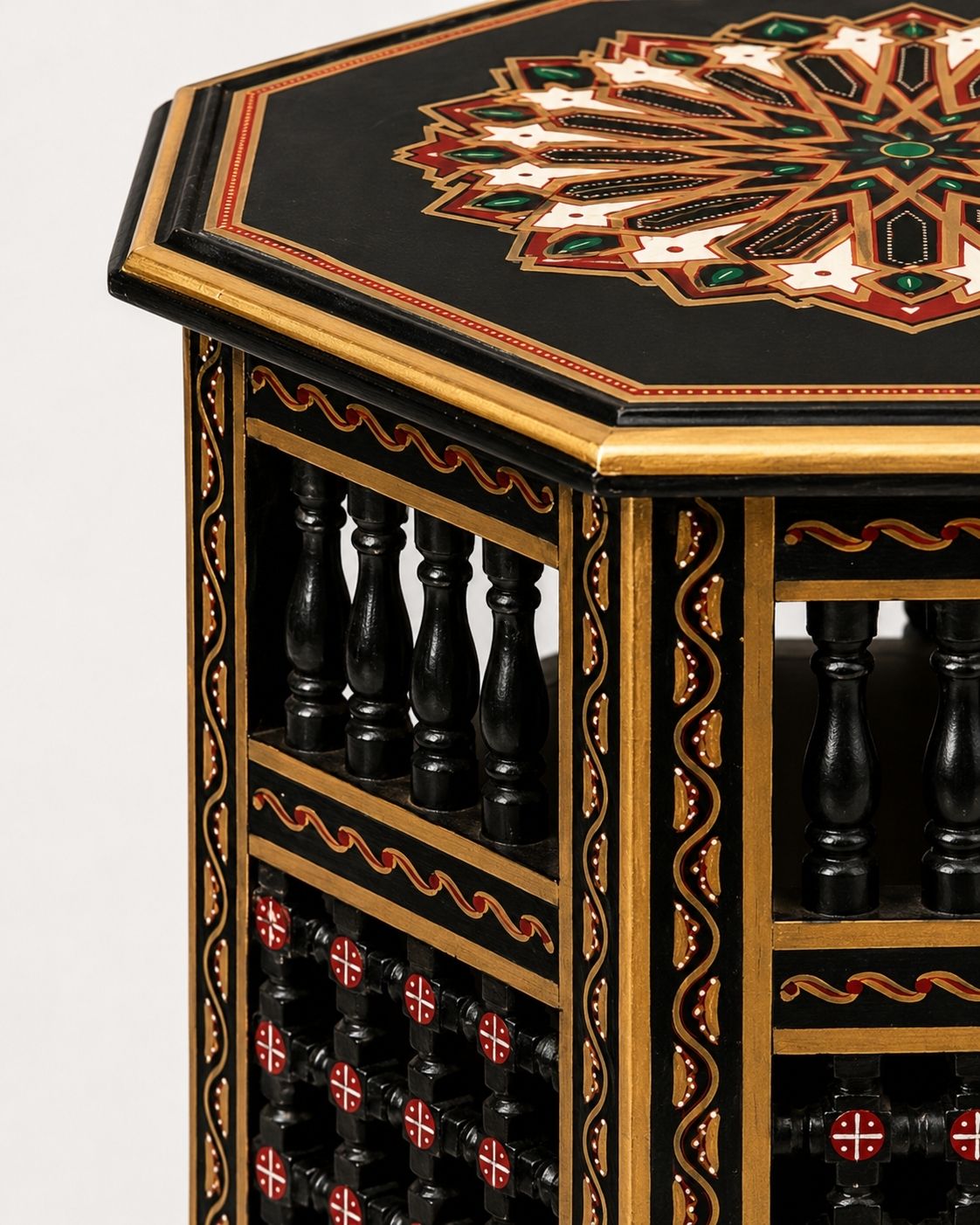 Moroccan octagonal end table styled beside a cream living room sofa 