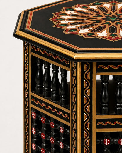 Moroccan octagonal end table styled beside a cream living room sofa 