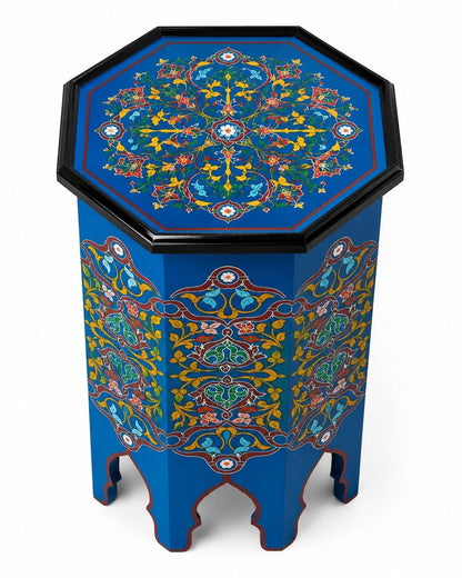 Blue Moroccan pedestal table styled in a warm boho living room 