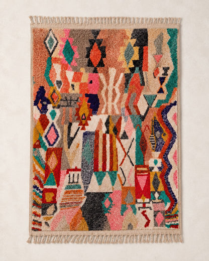 Hand-finished fringe detail on a handmade Moroccan wool rug. 