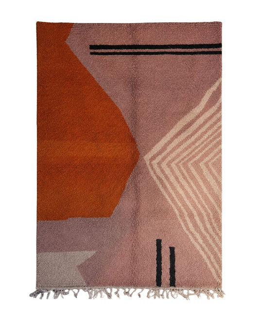 Handmade blush pink Moroccan wool rug with abstract geometric design. 