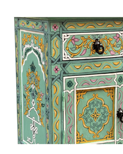 Decorative cabinet with intricate patterns and colors on a white background