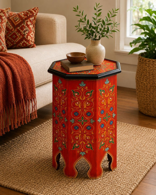 Red-orange Moroccan side table with floral tabletop medallion 