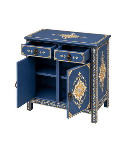 Decorative blue cabinet with gold intricate designs on a white background
