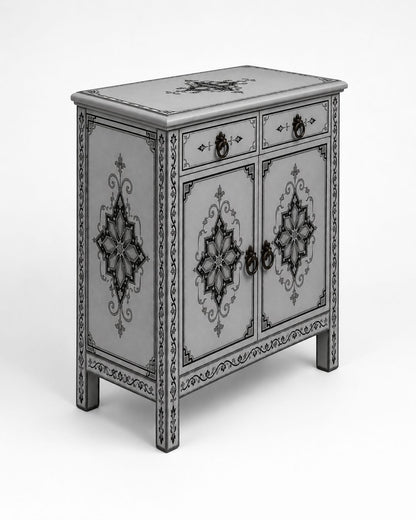 Moroccan gray storage cabinet styled beside a neutral bedroom bed