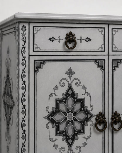 Decorative cabinet with intricate black patterns on a white background