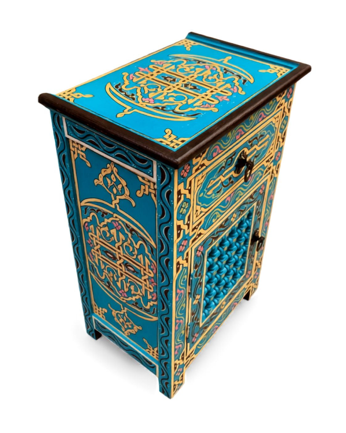 Blue and gold boho nightstand beside bed with vase and soft decor 