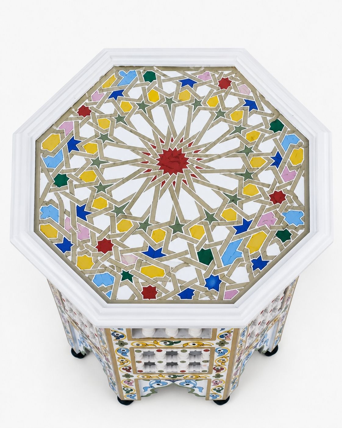 White Moroccan accent table with decorative spindle panels 