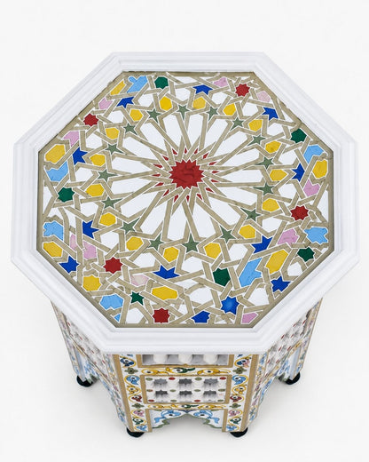 White Moroccan accent table with decorative spindle panels 