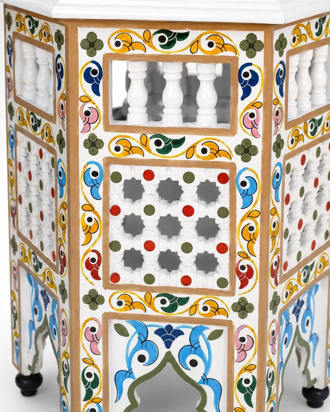 Colorful hand-painted wooden table with Moorish arch details 