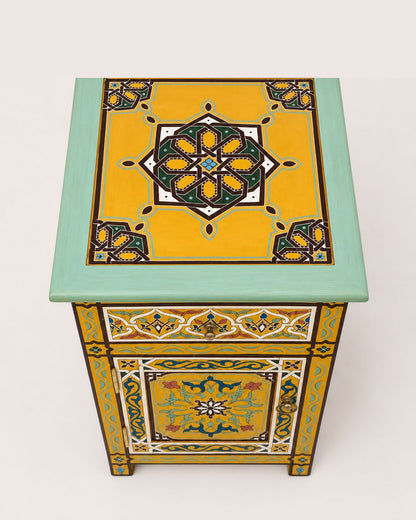 Yellow boho bedside table with mint green top and storage 